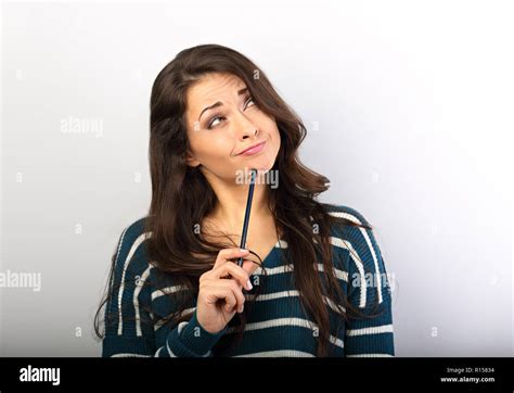 Confusion Grimacing Brunette Woman Thinking And Looking Up With