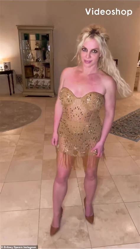 Britney Spears Flaunts Her Curves In A Sparkling Gold Tasseled Dress