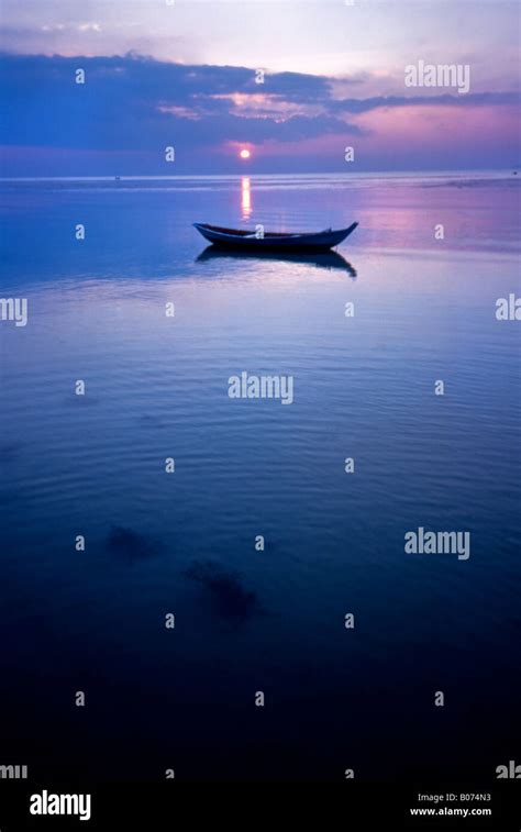 Rowing Boat Calm Water Stock Photo Alamy