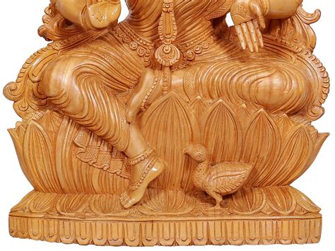 Wooden Idol Of Devi Lakshmi Seated On Lotus Throne Exotic India Art