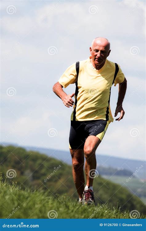 Older Man Jogging Running On Meadow Stock Photo Image Of Running