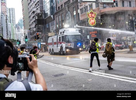 The Water Cannon Spraying At Protesters During The Demonstration