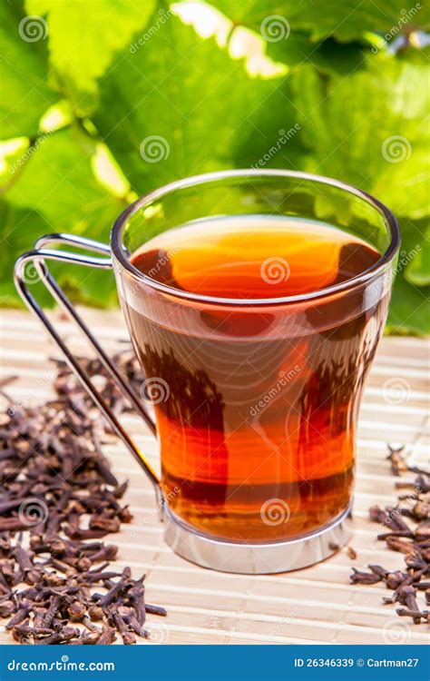 Tea with cloves stock image. Image of desk, leaf, warm - 26346339