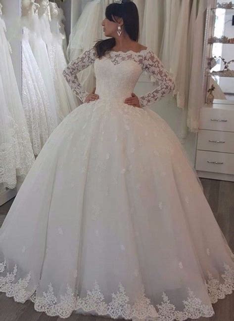 Robe de mariée princesse dentelle manches longues épaules nues Robe