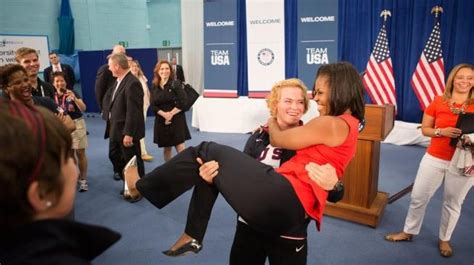 Michelle Obama lifted by Olympic wrestler Elena Pirozhkova - UPI.com