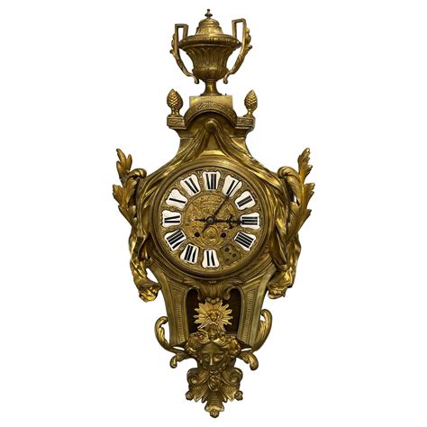 Pendule de cheminée unique en bronze doré de la fin du XIXe et du début