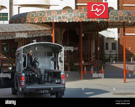 A Pakistani Security Officer Guards The Cardiac Ward Where Jailed