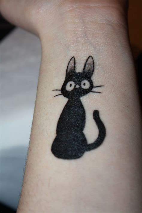 32 Awesome Cat Wrist Tattoos Designs