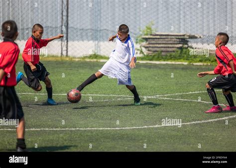 Football soccer training for kids. Coach explaining the game plan ...