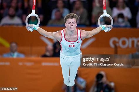 Felix Dolci Of Canada Performs His Rings Routine During The Mens