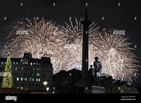 London, UK. 1st Jan, 2023. New Year fireworks in London with Nelson's Column in Trafalgar Square ...