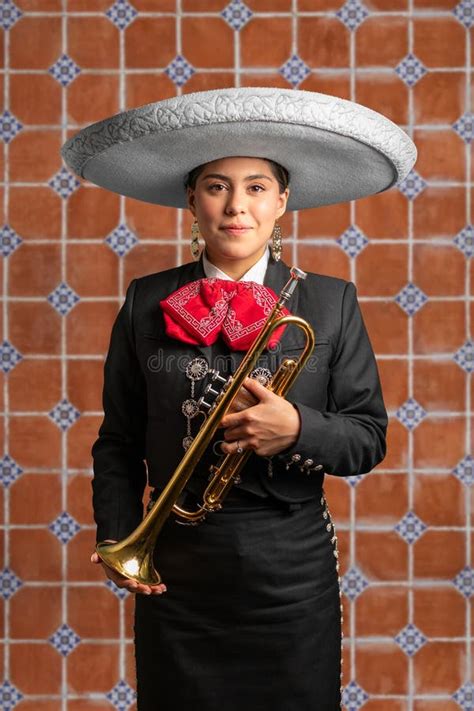 Pretty Female Mexican Mariachi Trumpetist Woman Smiling Using A