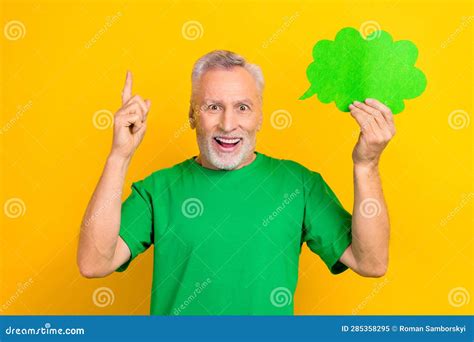 Photo Of Funny Excited Guy Dressed Green T Shirt Pointing Finger Speaking Cloud Empty Space