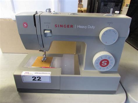 SINGER HEAVY DUTY SEWING MACHINE - Able Auctions