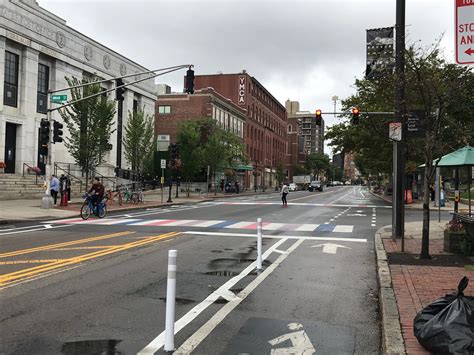 Cambridge Officials Propose Protected Bike Lanes on Most of Mass. Ave