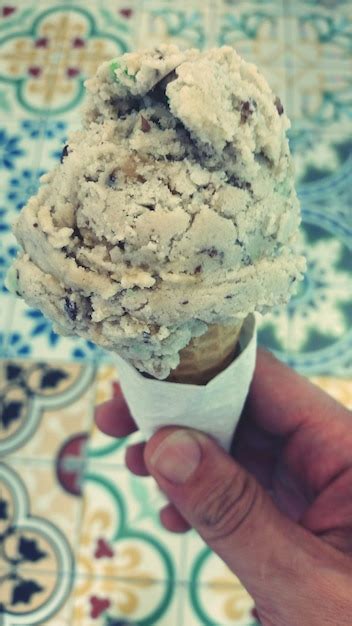 Premium Photo Cropped Image Of Man Holding Ice Cream Cone