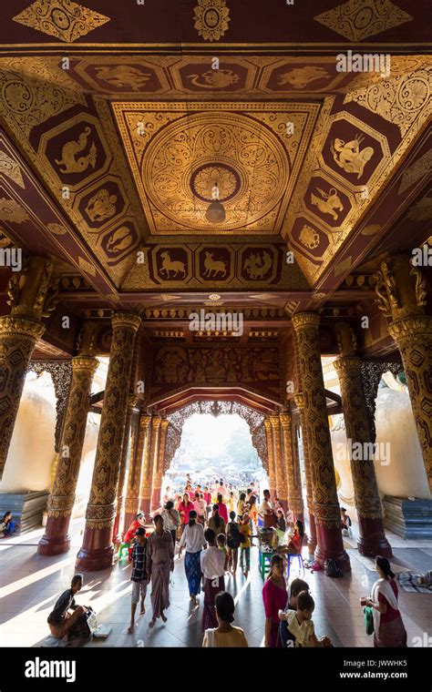 A Lot Of People Inside The Shwedagon Pagoda S Ornate Eastern Entrance