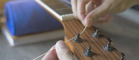 guide  restringing  acoustic guitar blue hens