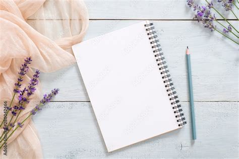 blank paper notepad pencil pastel pink color blanket lavender