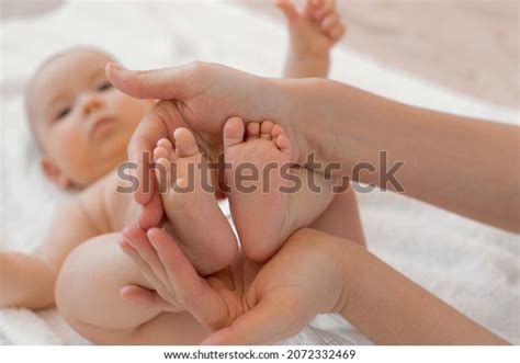 Hands Hold Babys Legs Stock Photo Shutterstock