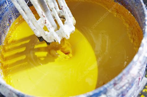 Vat Of Yellow Paint Being Mixed Stock Image F006 6088 Science