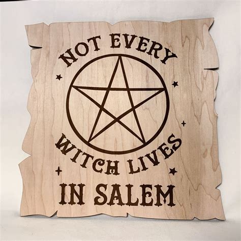 A Wooden Sign With The Words Not Every Witch Lives In Salem On It And