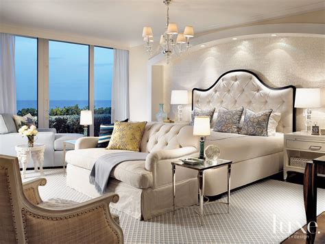 Contemporary White Bedroom with Tufted Sofa - Luxe Interiors + Design