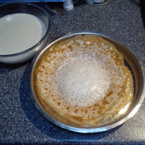 sarguna's fantabulous kitchen: Pal Appam With Sweetened Coconut Milk