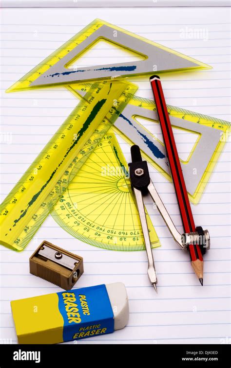 School Mathematical Instruments On Lined Notebook Paper Geometry Stock