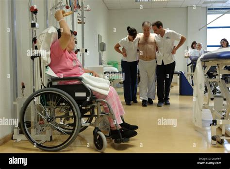 Patients Doing Physical Rehabilitation Exercises At Hospitals