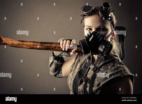 Brutal Woman In A Steampunk Mask And Ax In Hands Stock Photo Alamy