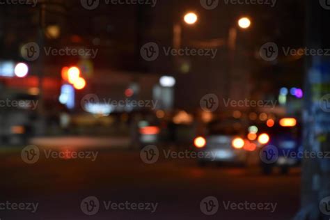 Multicolored lights of the night city. Glowing city road at night. 22724020 Stock Photo at Vecteezy