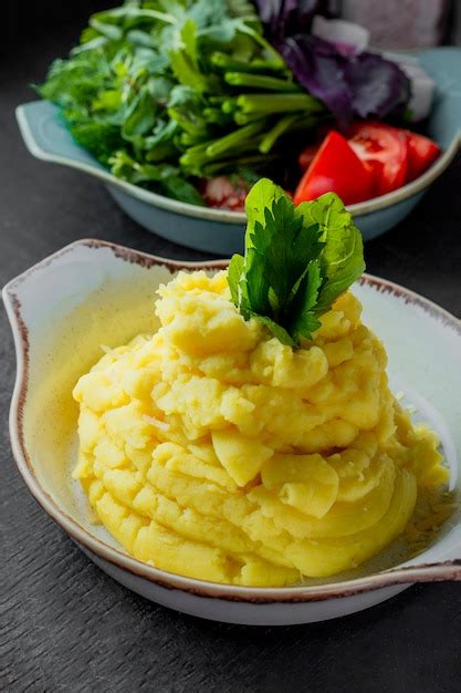 photo mashed potatoes served  fresh vegetables  greens