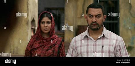 Dangal From Left Sakshi Tanwar Aamir Khan 2016 © Walt Disney