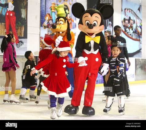 Mickey Mouse And Googy Skate With Kids At A Press Conference For The