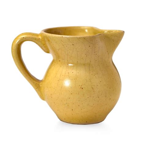 Premium Photo Earthenware Yellow Jug Isolated On White Background