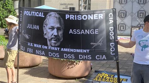 Supporters of Julian Assange rally at Justice Dept. on 4-year ...