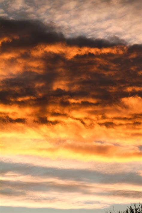 Purple and Blue Clouds in a Sunset Sky · Free Stock Photo