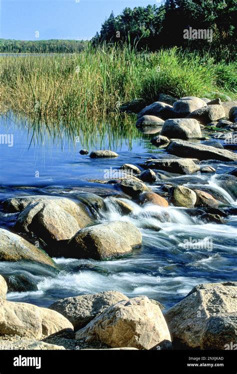 The Mississippi River Starts With Water Flowing Over Small Boulders Out