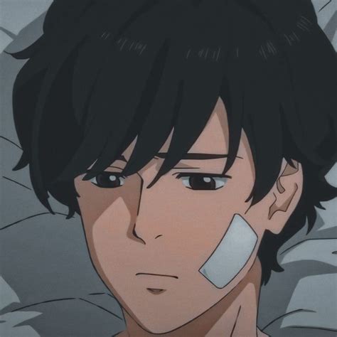 An Anime Character With Black Hair And White Eye Patches On His Face