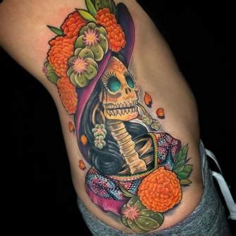 Tatuaje del artista Mexicano Oscar Ortiz Escena del rey león