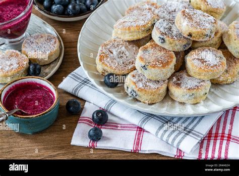 Traditional Fennel Welsh Cakes With Blueberry Coulis Stock Photo Alamy