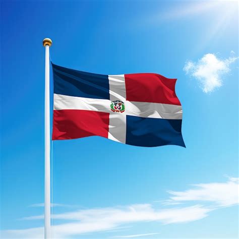 Ondeando la bandera de república dominicana en el asta de la bandera