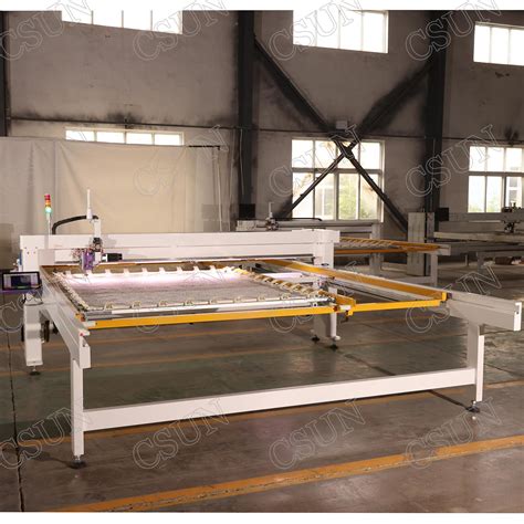 computerized sewing and quilting machine 10