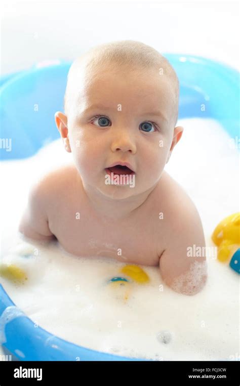 Baby Boy and Yellow Duck Stock Photo - Alamy