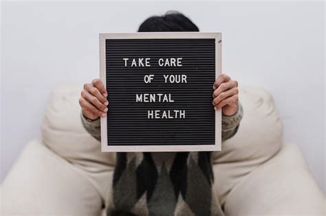 Premium Photo Man Holding Letterboard With The Words Take Care Of