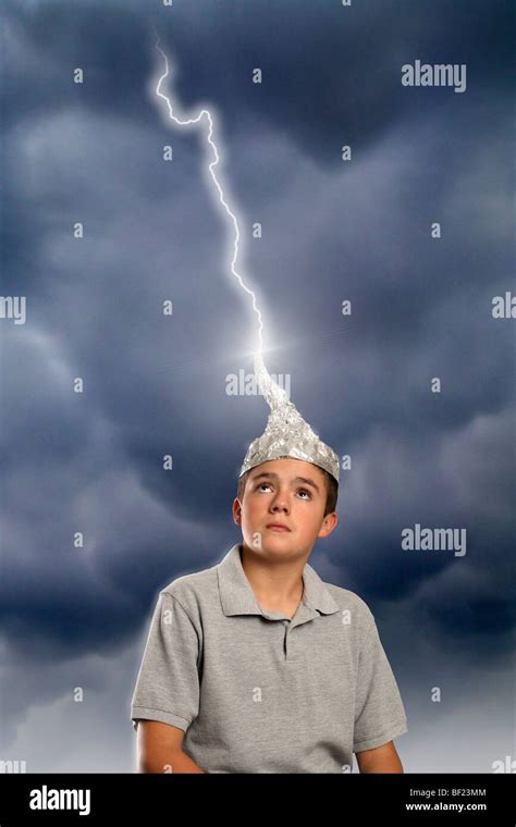 Boy Wearing Tin Foil Hat Struck By Lightning Stock Photo Alamy