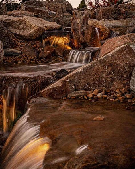 25 Small Ponds With Waterfalls Worth Adding to Your Yard