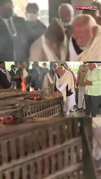 Pm Modi Performs Last Rites With Brothers As Mother Heeraben Is