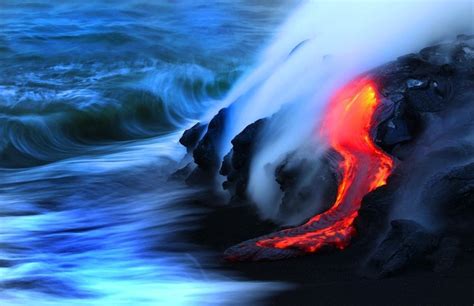 Nature Collides As Hot Lava Flows Into The Cool Ocean